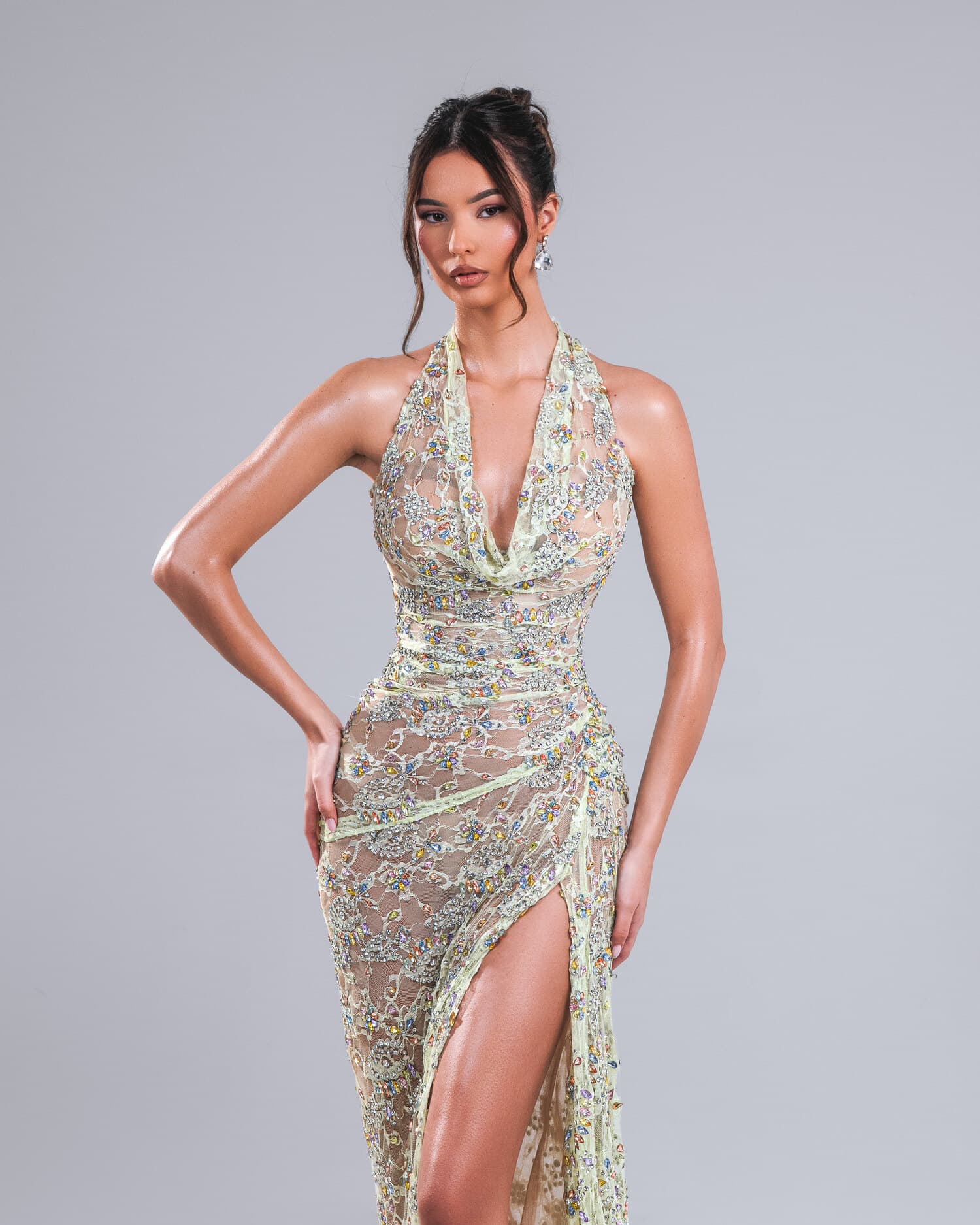 CHAMPÉLLE — champagne-gold crystal halter gown with plunging neckline and thigh slit, AURORA collection by BLINI