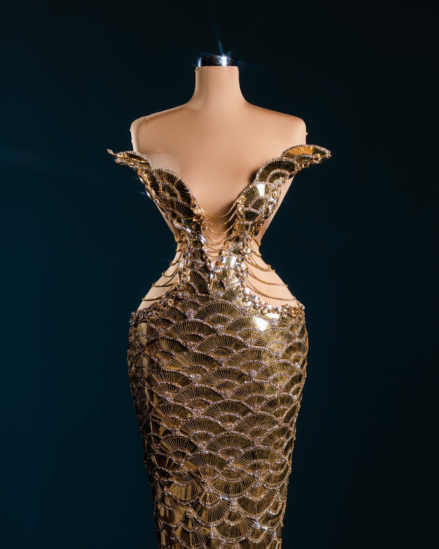 AURENNA — gold fan scale gown with crystal chain draped neckline