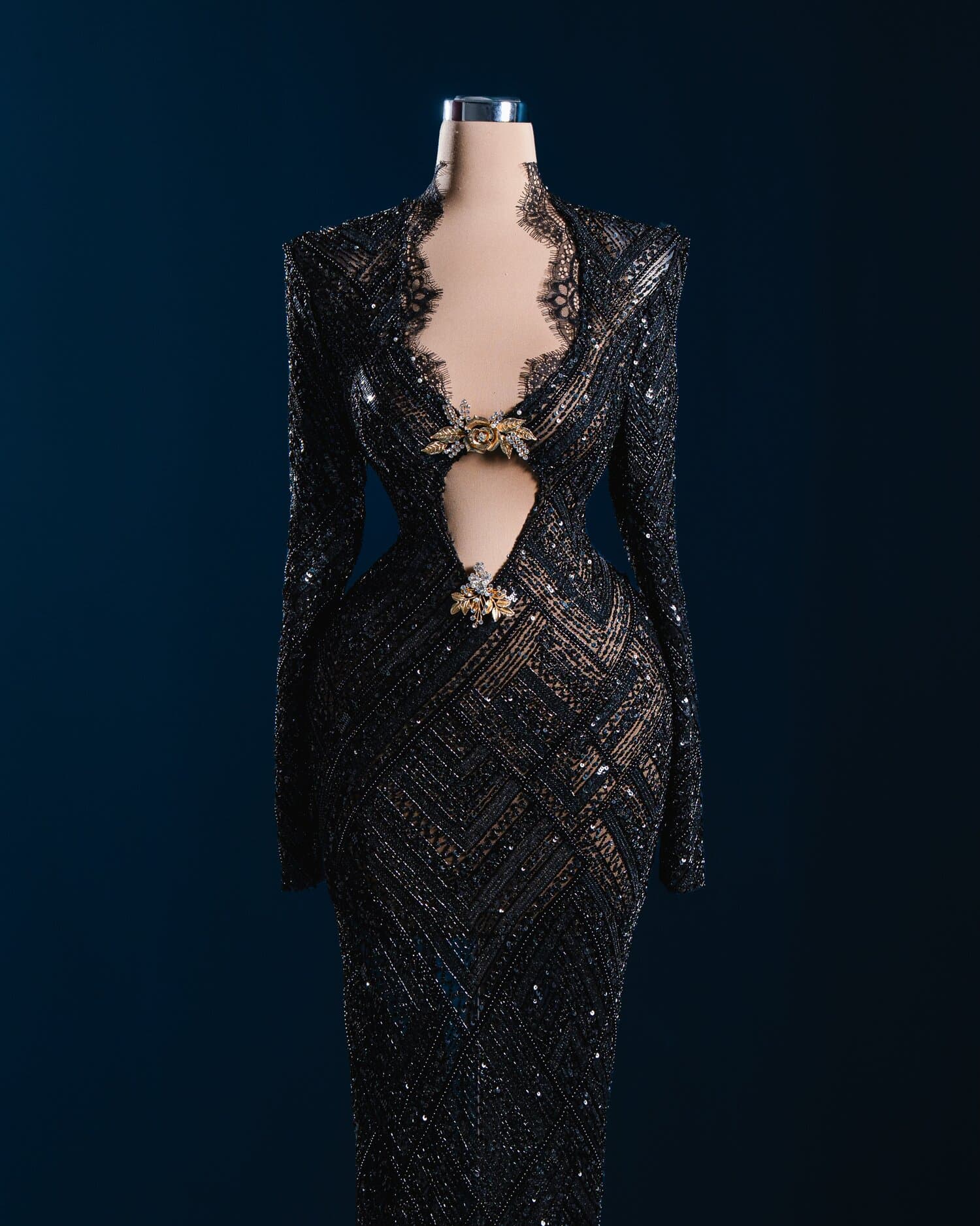 DELPHINE — black beaded keyhole gown with gold rose brooch