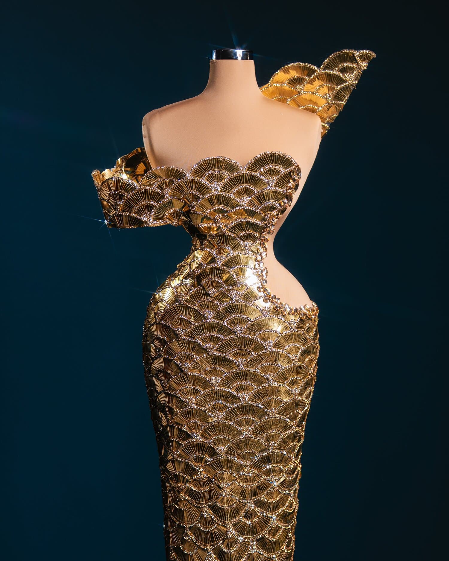 EMBERLY — gold fan scale one shoulder gown with wing detail