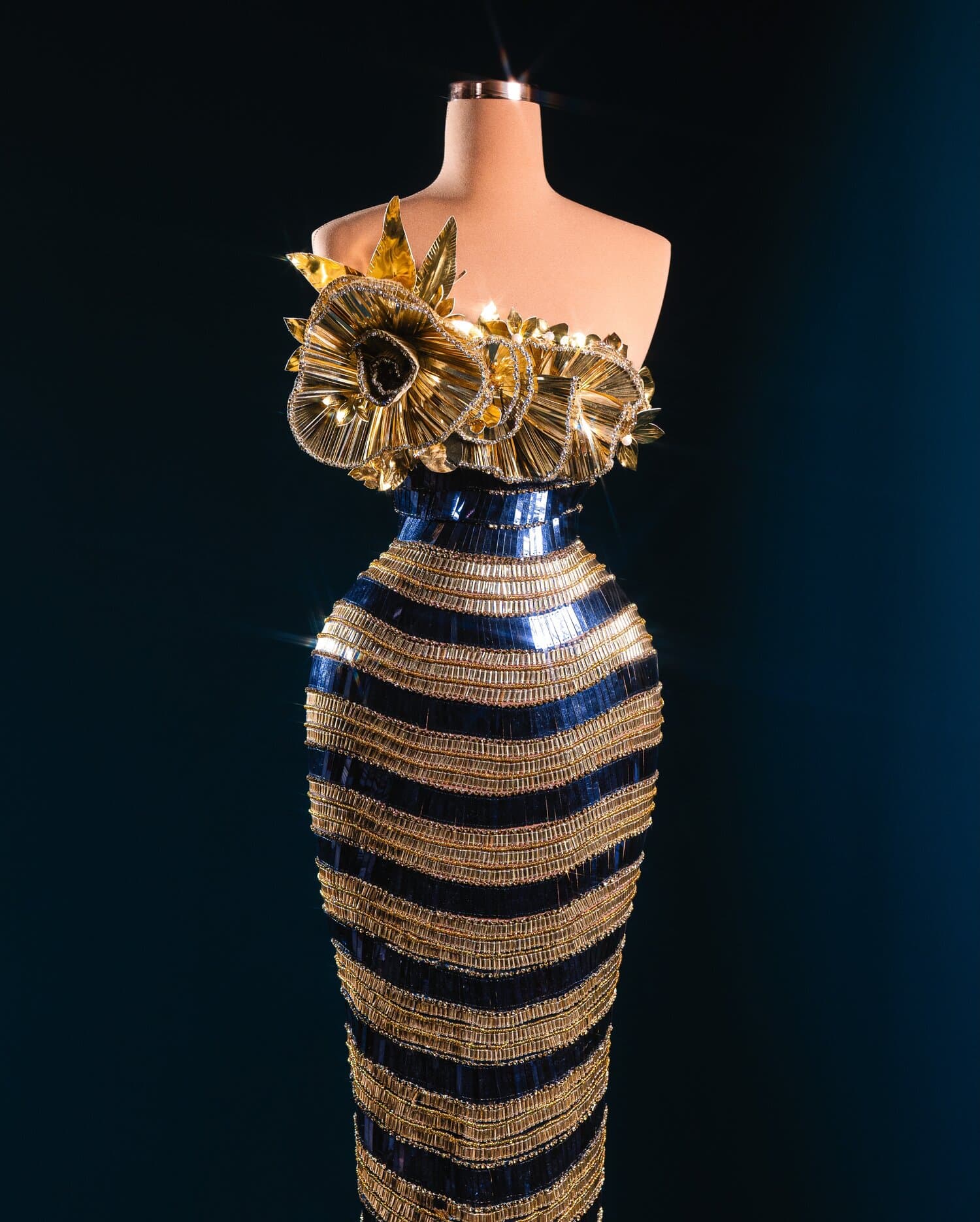 FLORIANA — navy and gold striped gown with metal flower bust