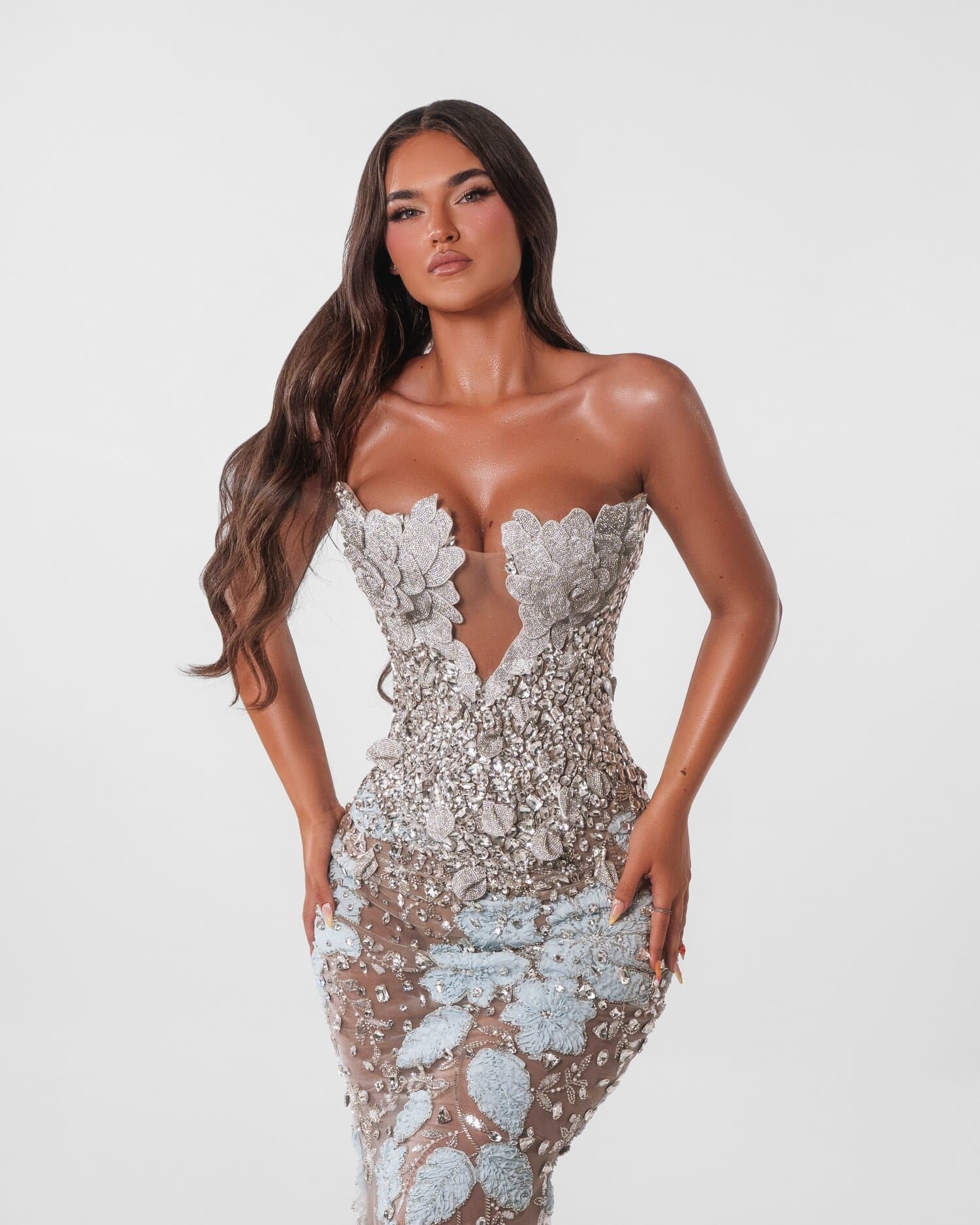 BRUMELLE — Ice-blue couture mermaid with a strapless plunge bodice paved in silver crystal,