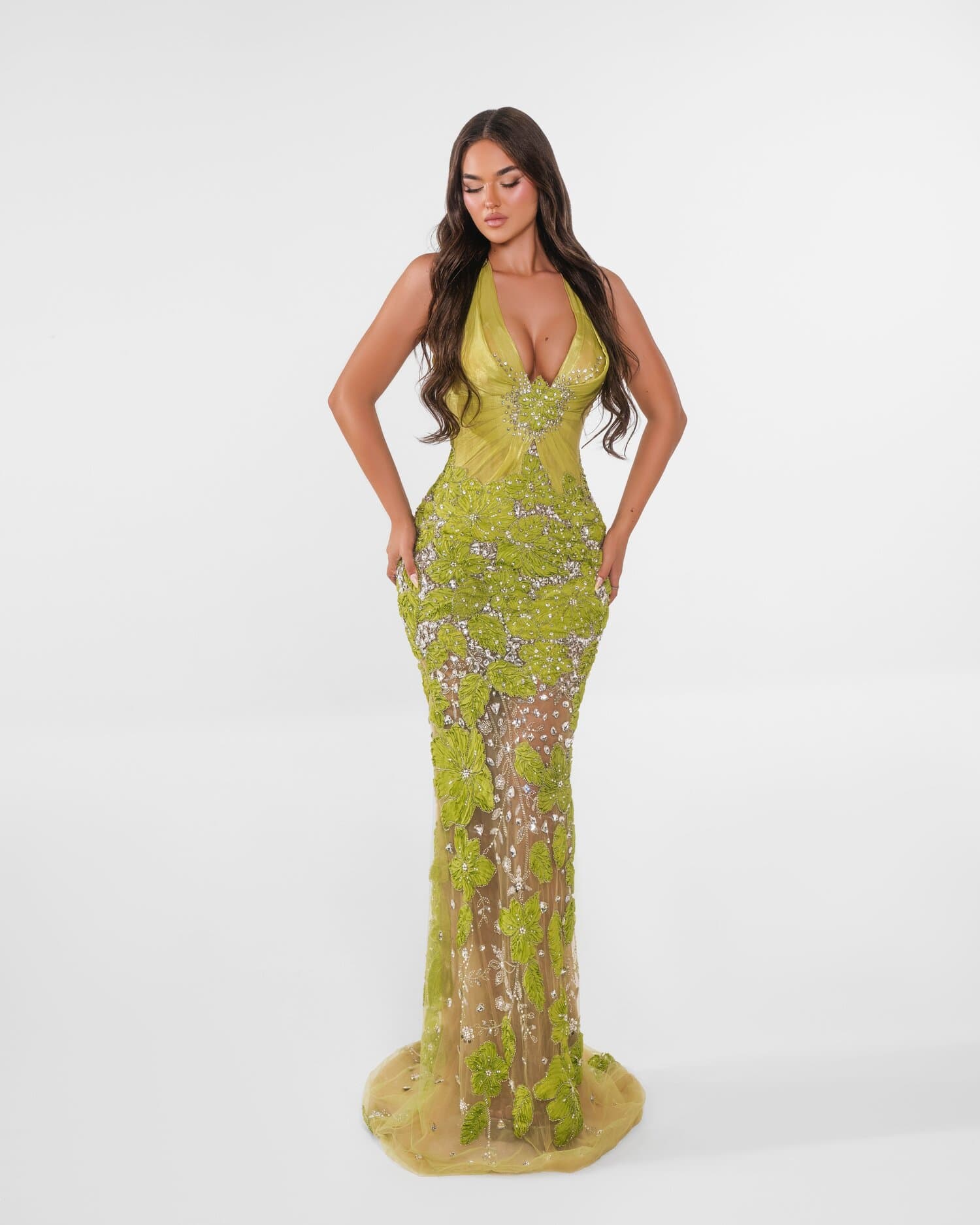 PISTACHELLE — Deep-V halter column in pistachio-chartreuse, a knotted satin waist over crystal