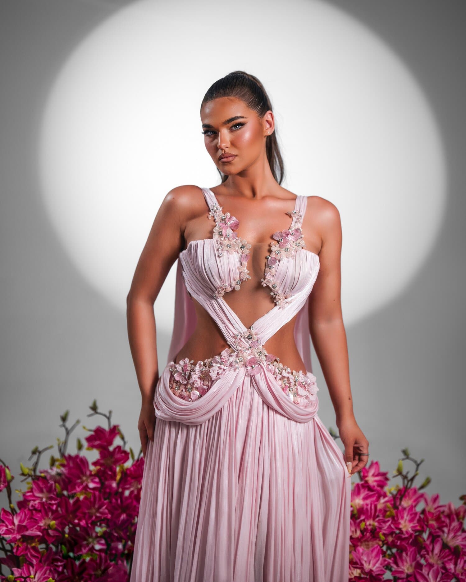 ROSINA — blush-pink goddess gown with floral crossover straps and cape train, FLEURA collection by BLINI