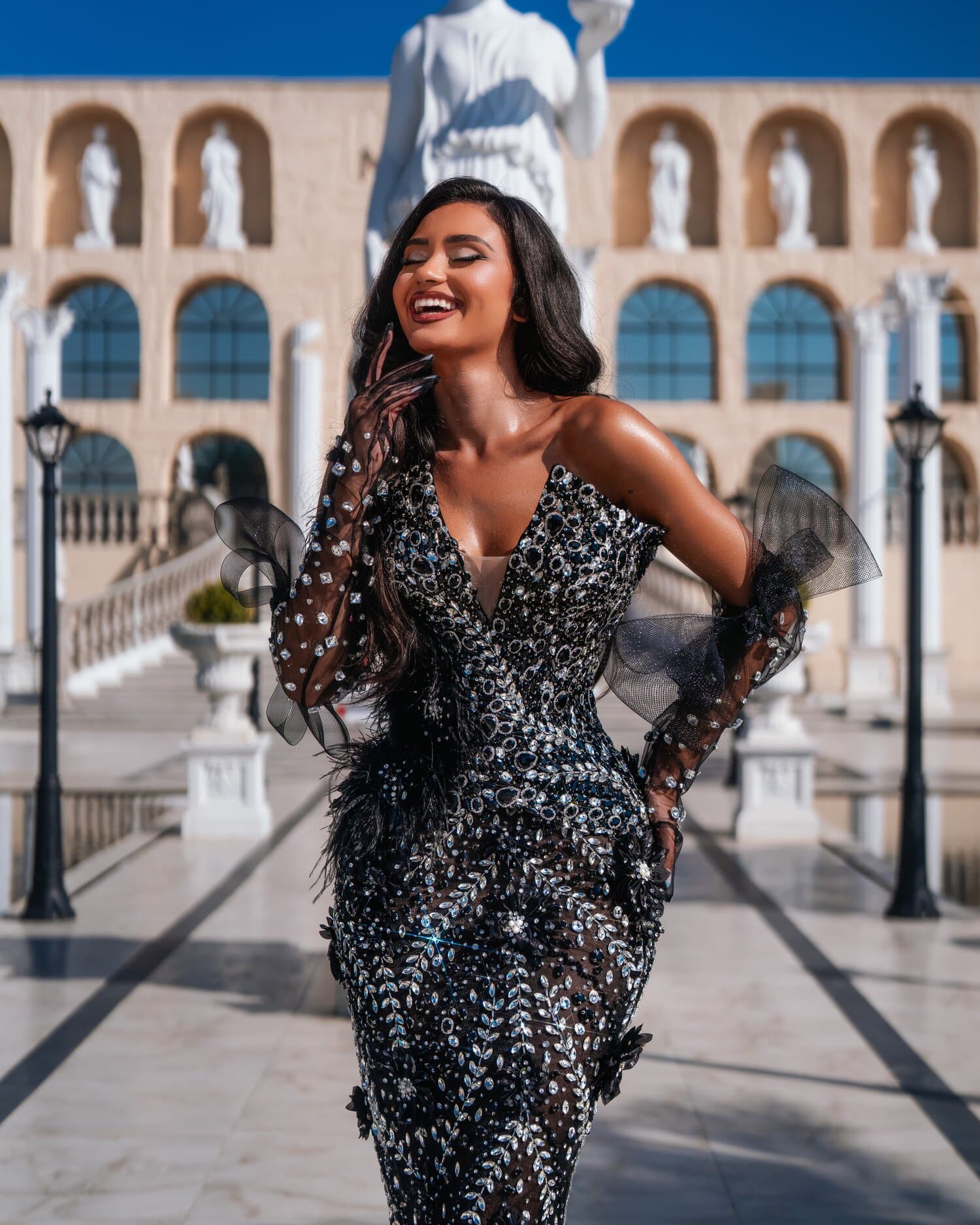 OBSIDIENNE — black crystal deep-V gown with sheer ruffle sleeves, RIVIERA collection by BLINI