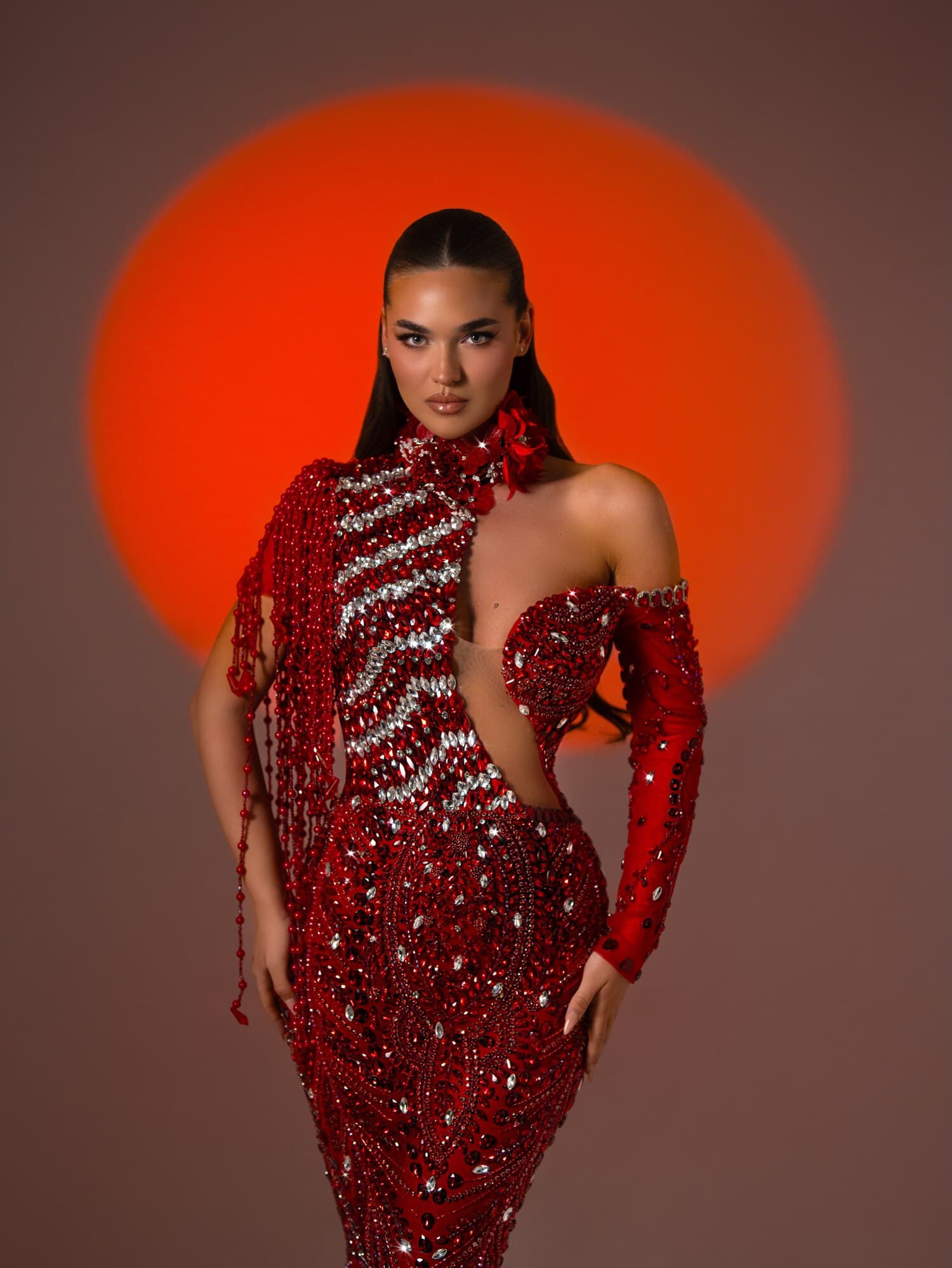SCARLETTE — scarlet crystal high-neck gown with silver beaded chevrons and asymmetric fringe sleeve, ÉCLAT collection by BLINI