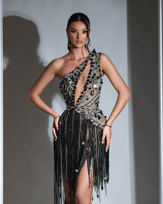Elegant black and silver short dress with tassels, featuring a deep chest cut-out
