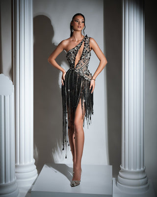 Black and silver short dress with one-shoulder design, embellished with crystals and stones