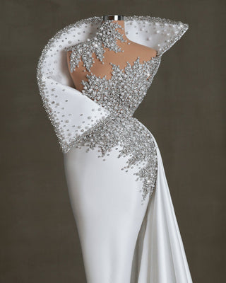 Long white satin bridal dress with crystals and pearls embellishments