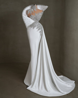 Elegant bridal dress with 3D design and side tail flowing to the floor