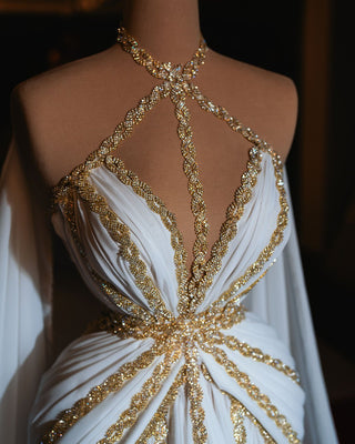 Close-up of the detailed gold accents on the Clementine Bridal Dress.