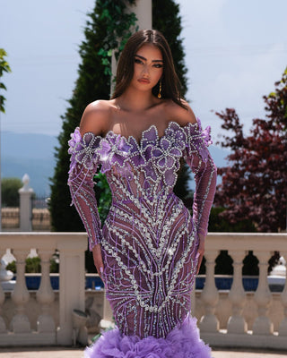  Full-length Ellie Off Shoulder Long Purple Dress with cascading ruffles for a dramatic effect.