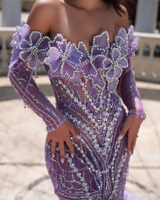 Close-up of the Ellie Off Shoulder Long Purple Dress showcasing its intricate ruffled skirt design.