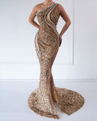 
A shimmering gold one-shoulder dress adorned with sparkling crystals, perfect for formal occasions.