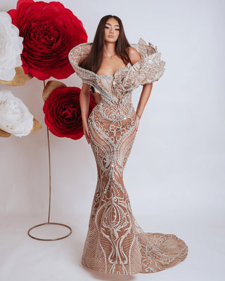 Long off shoulder dress embellished with silver crystals and 3D leaf design