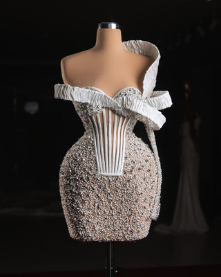 Handcrafted short bridal dress with one-shoulder design, corset bodice, and beaded details