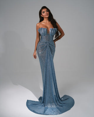 
Sleeveless blue dress with a corset bodice and flowing train.