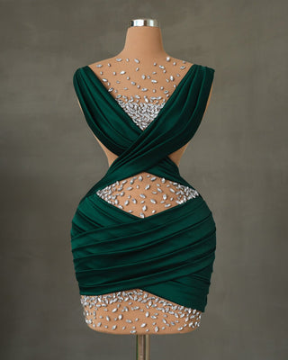 Emerald green satin short dress with side cut-outs and crystal embellishments