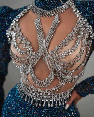 Close-Up of Stone Embellishments on Sequin Dress