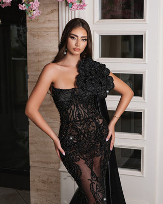 Matilda Black Dress with Glittering Stones featuring a sleek, elegant design.