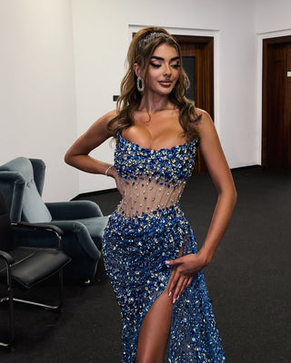 Megi Shehaj stunning in Blini's sequin blue dress at Miss Universe