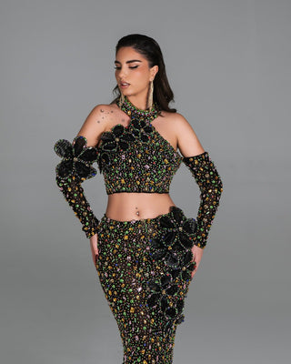 Paola two-piece dress featuring a crop top and mermaid skirt with intricate floral design.