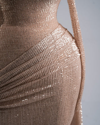 Sophisticated nude gown with sleek draping and modern details.