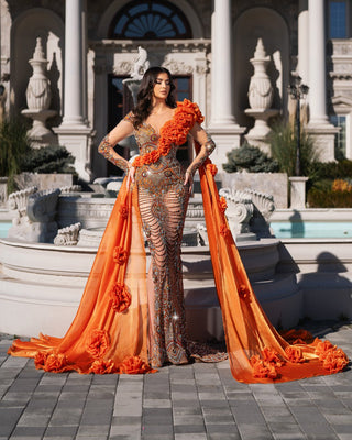 Vibrant orange dress featuring crystal accents for a glamorous look.