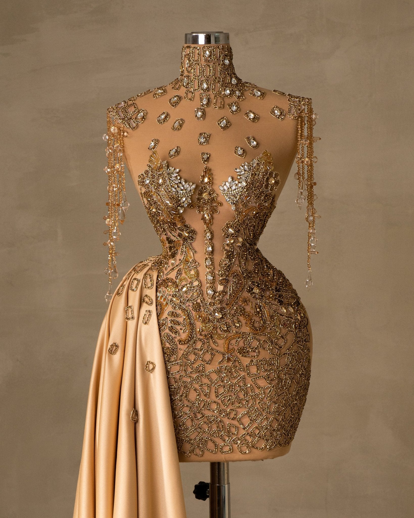 Gold party wear gown with popular stone embellishments