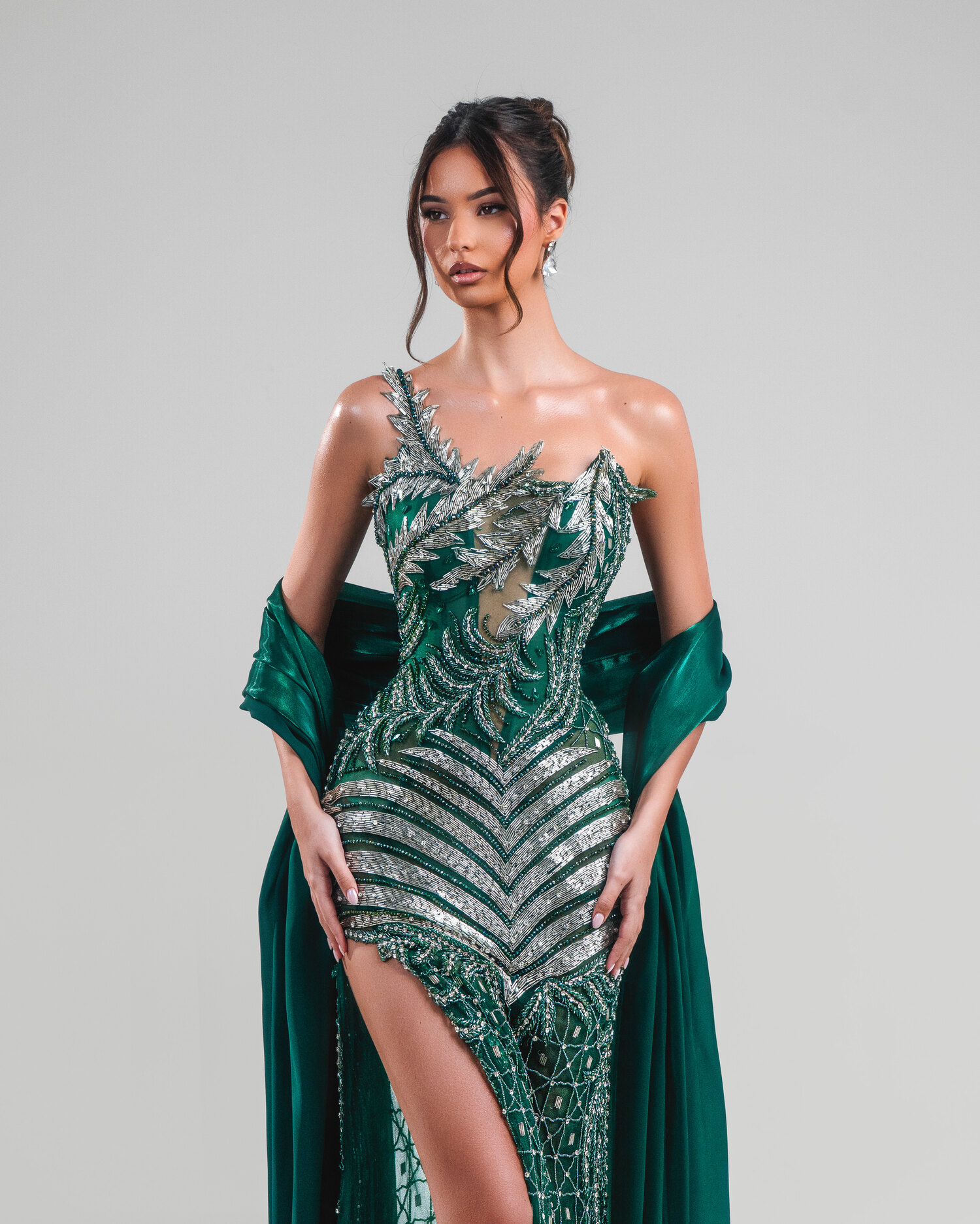 ÉMERAUDE — emerald geometric-sequin one-shoulder gown with thigh slit, AURORA collection by BLINI