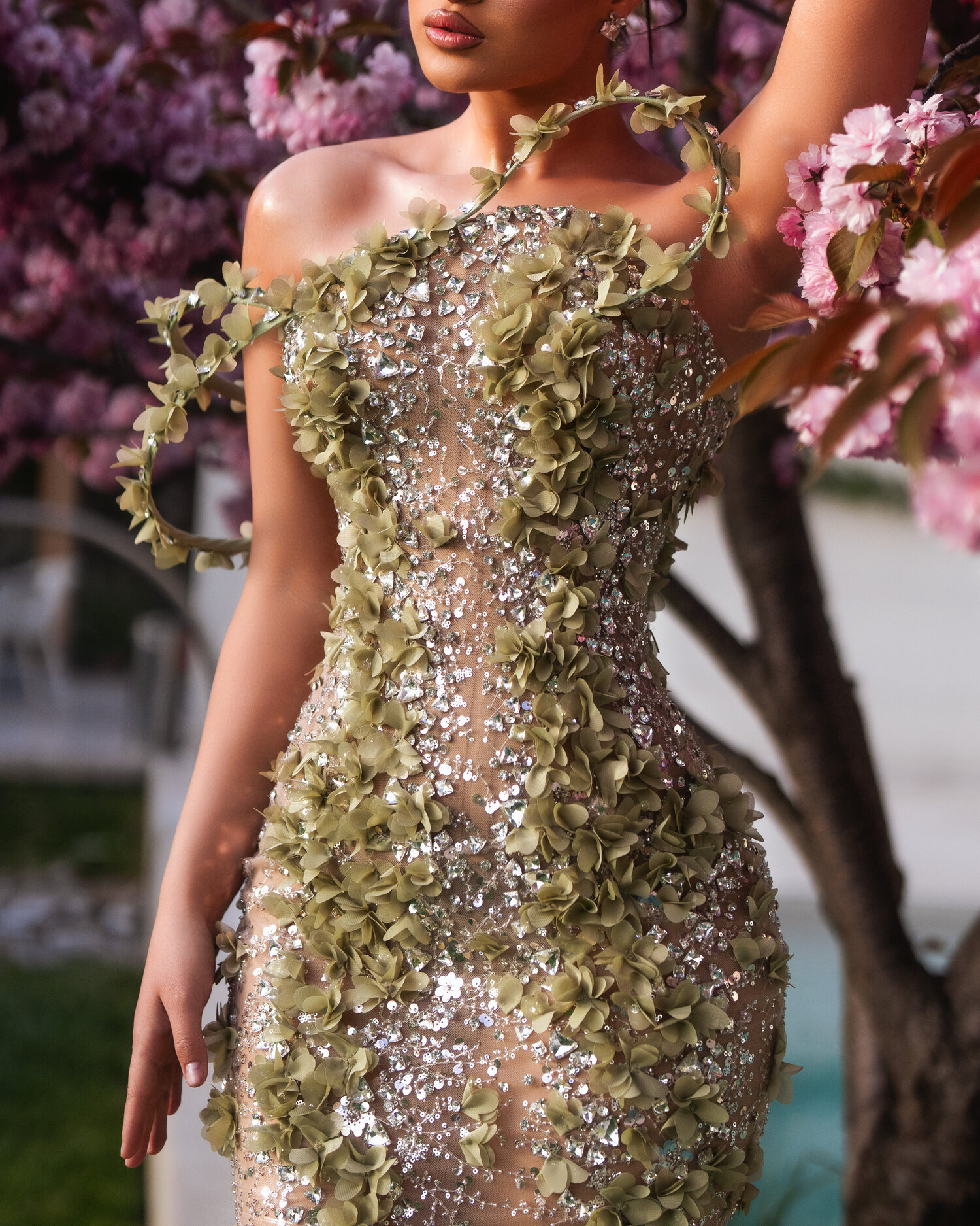 AURIA — shoulder and torso closeup, sage-leaf vines and crystal beading