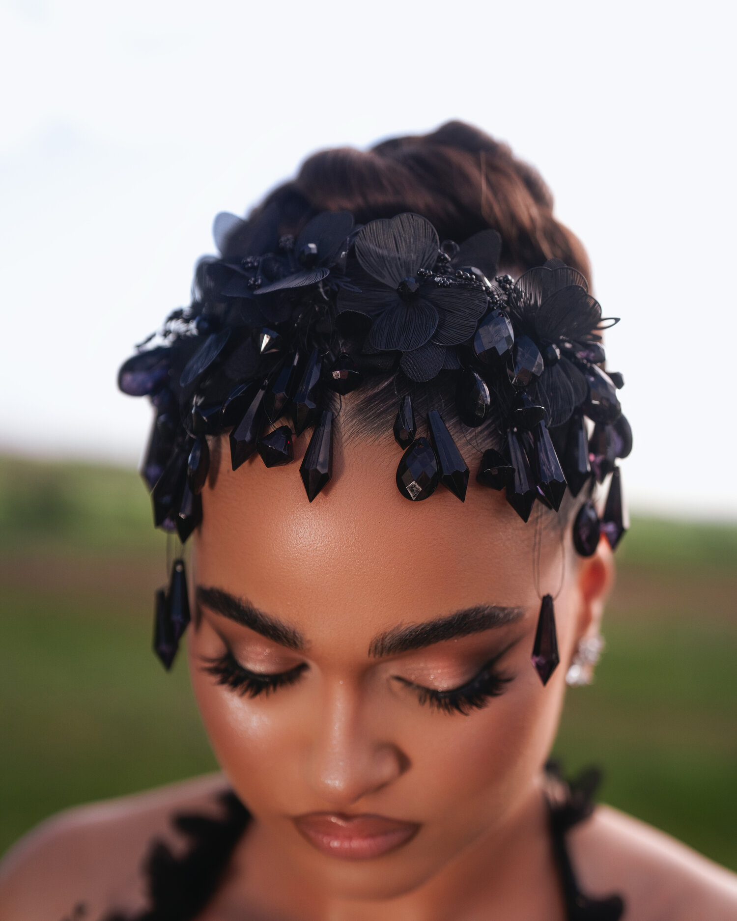 NYRA — floral crown headpiece detail, beauty closeup