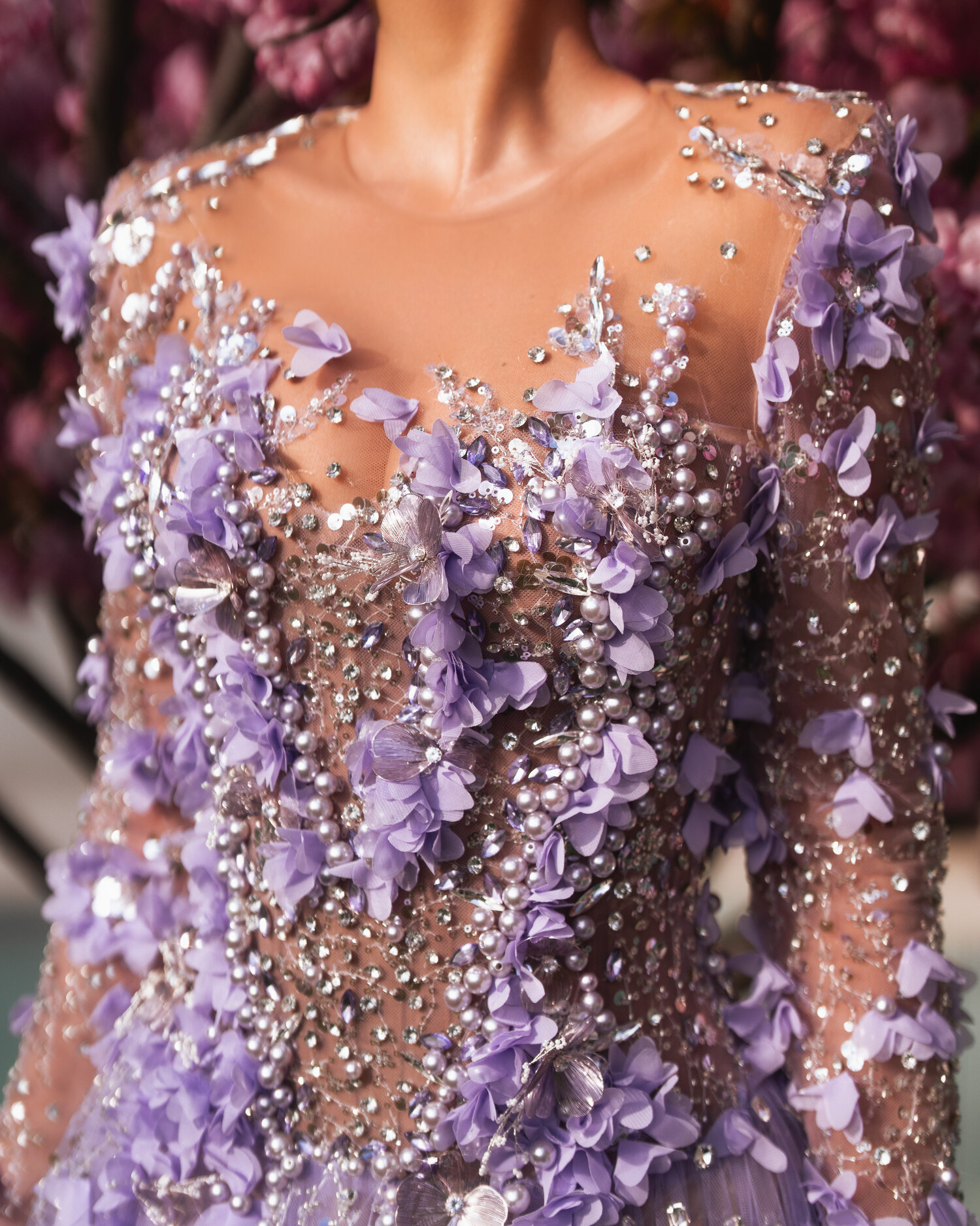 VIRELLA — bodice closeup, illusion neckline with 3D petals and crystal work