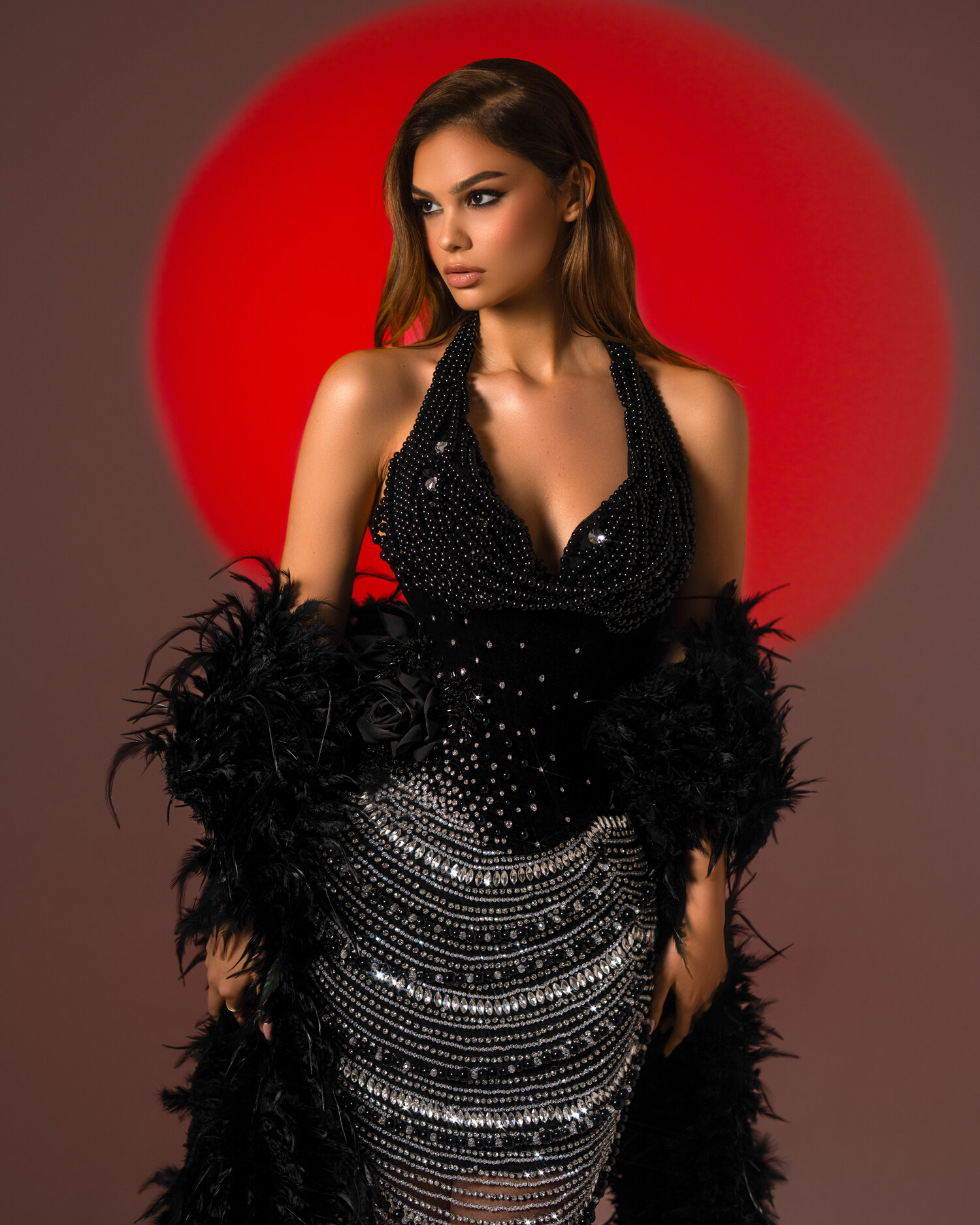 CENDRÉA — smoke-grey gunmetal-sequin gown with feather sleeves and plunging halter, ÉCLAT collection by BLINI