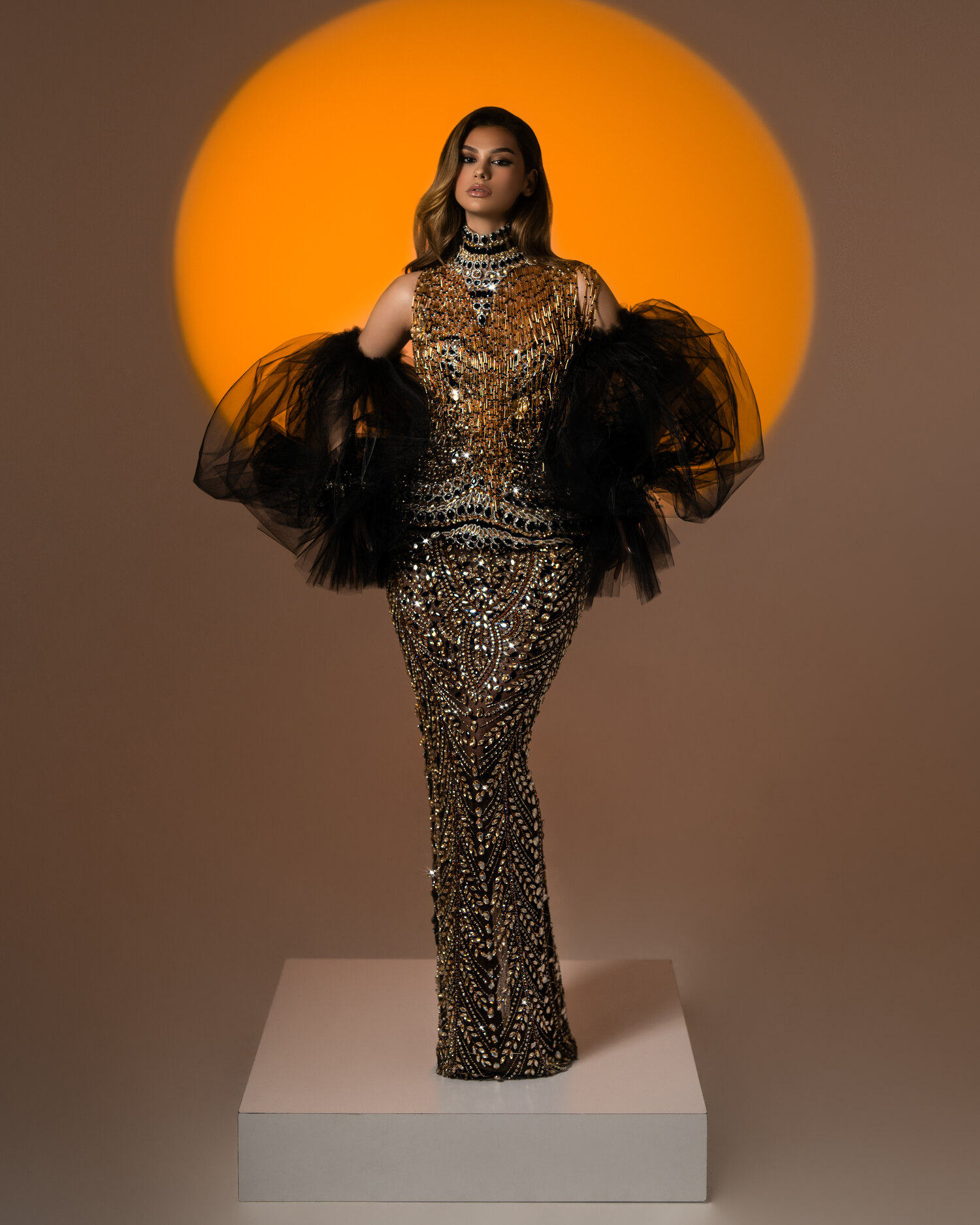 DORÉA — antique-gold sequin mermaid with feather sleeves, ÉCLAT collection by BLINI